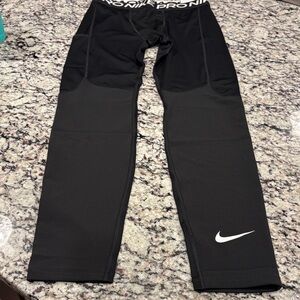 NWT Nike Pro Youth Black Performance Leggings with hip pocket.  Size XL
